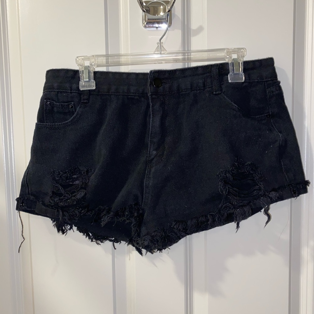 black distressed shorts